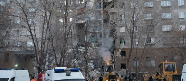 Colapso de un edifico residencial en Magnitogorsk, Rusia - Sputnik Mundo