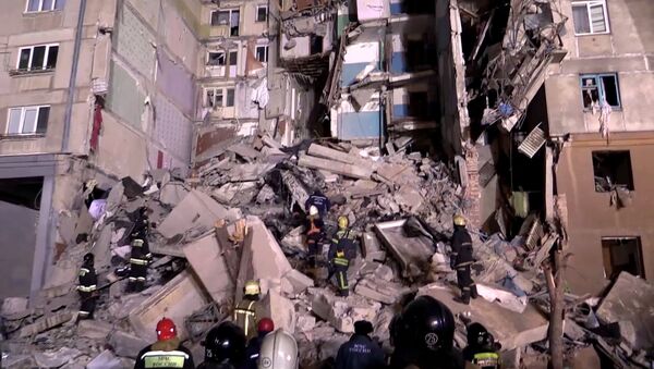 Colapso de un edifico residencial en Magnitogorsk, Rusia - Sputnik Mundo
