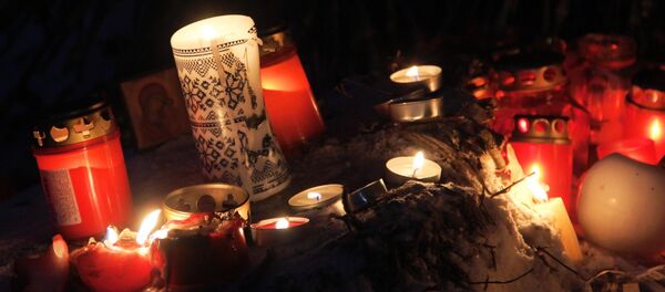 Velas en el lugar de la tragedia - Sputnik Mundo