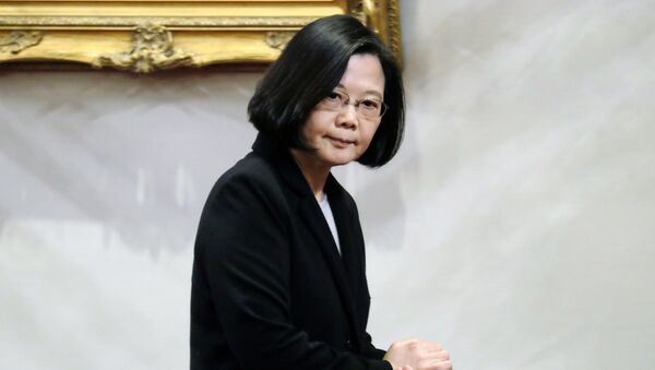 La presidenta de Taiwán, Tsai Ing-wen, se marcha tras una conferencia de prensa en el palacio presidencial de Taipéi - Sputnik Mundo