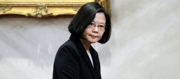 La presidenta de Taiwán, Tsai Ing-wen, se marcha tras una conferencia de prensa en el palacio presidencial de Taipéi - Sputnik Mundo