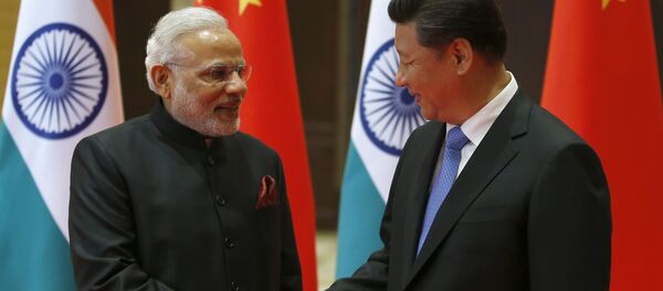 El primer ministro indio, Narendra Modi, y el presidente chino, Xi Jinping - Sputnik Mundo