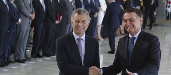El presidente de Argentina, Mauricio Macri, con su par brasileño, Jair Bolsonaro - Sputnik Mundo