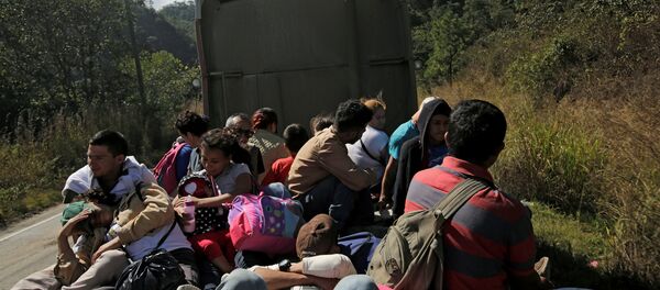 Migrantes hondureños - Sputnik Mundo