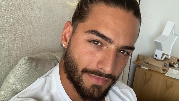 Maluma en recuperación luego de una intervención quirúrgica - Sputnik Mundo