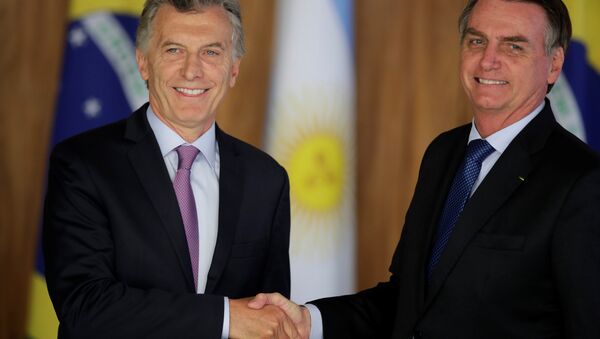 El presidente de Argentina, Mauricio Macri, con su par brasileño, Jair Bolsonaro - Sputnik Mundo