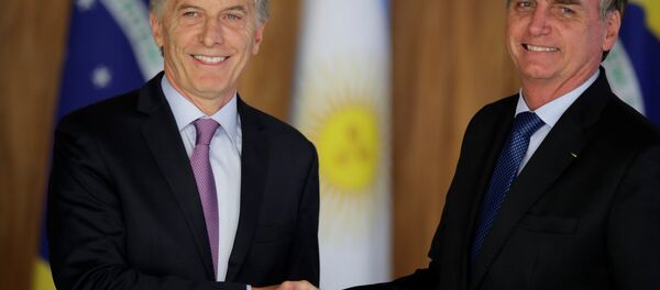 El presidente de Argentina, Mauricio Macri, con su par brasileño, Jair Bolsonaro - Sputnik Mundo