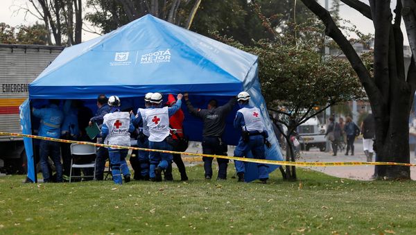 Los médicos en el lugar del atentado en Bogotá Los médicos en el lugar del atentado en Bogotá - Sputnik Mundo