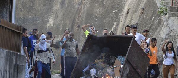 Protestas contra las autoridades venezolanas en Cotiza, Venezuela - Sputnik Mundo