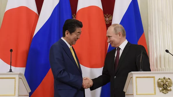 Shinzo Abe, primer ministro de Japón, y Vladímir Putin, presidente de Rusia - Sputnik Mundo