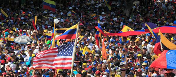 Una manifestación de opositores al Gobierno de Nicolás Maduro en Caracas Una manifestación de opositores al Gobierno de Nicolás Maduro en Caracas - Sputnik Mundo