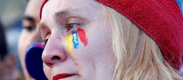 Manifestante en Venezuela - Sputnik Mundo