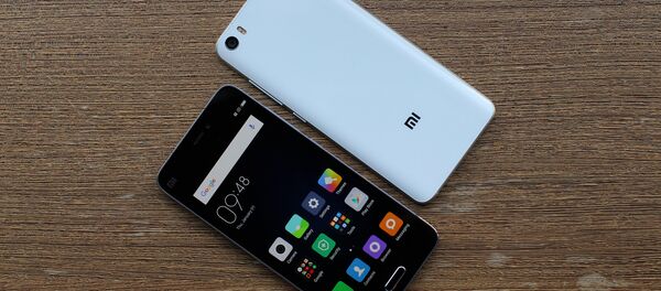 Unos celulares de la marca Xiaomi, foto archivo Unos celulares de la marca Xiaomi, foto archivo - Sputnik Mundo