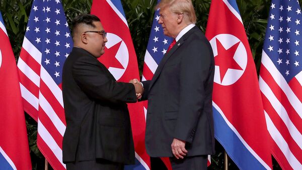 Kim Jong-un, líder norcoreano, y Donald Trump, presidente de EEUU - Sputnik Mundo