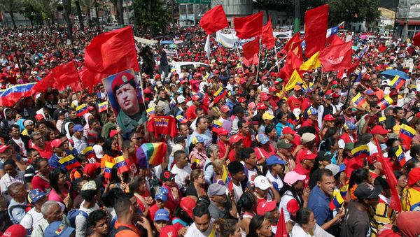Una manifestación en apoyo a Nicolás Maduro en Venezuela Una manifestación en apoyo a Nicolás Maduro en Venezuela - Sputnik Mundo
