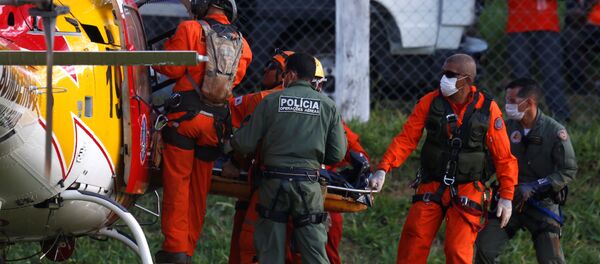 Cuerpo de la victima de la rotura de una represa en Brumadinho - Sputnik Mundo