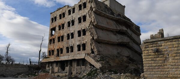 Edificio destruido en Aleppo, Siria - Sputnik Mundo