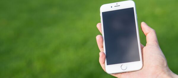 Un iPhone, teléfono móvil de Apple Un iPhone, teléfono móvil de Apple - Sputnik Mundo