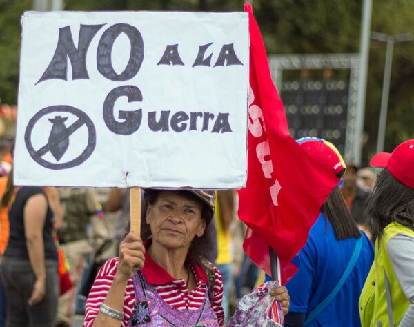 Las dos caras de Caracas: las manifestaciones con los partidarios de Maduro y Guaidó - Sputnik Mundo