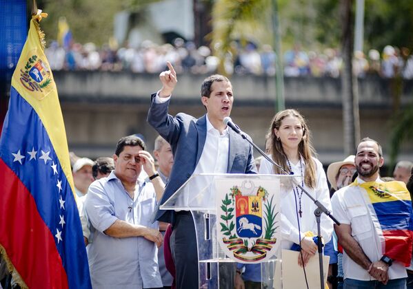 Las dos caras de Caracas: las manifestaciones con los partidarios de Maduro y Guaidó - Sputnik Mundo