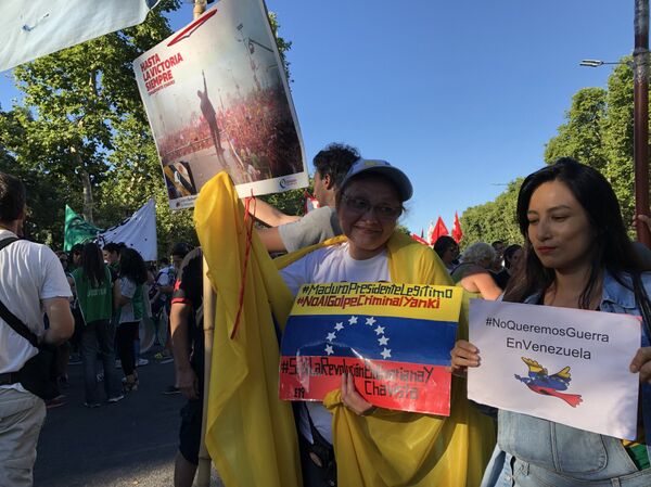 Marcha en Argentina contra la intervención de EEUU Marcha en Argentina contra la intervención de EEUU - Sputnik Mundo