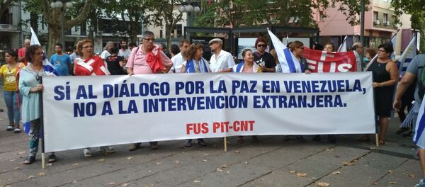 Manifestación Diálogo por la paz para Venezuela, convocada por el Pit-Cnt, el Encuentro Sindical Nuestra América y la Jornada Continental en Defensa de la Democracia y Contra el Neoliberalismo Manifestación Diálogo por la paz para Venezuela, convocada por el Pit-Cnt, el Encuentro Sindical Nuestra América y la Jornada Continental en Defensa de la Democracia y Contra el Neoliberalismo - Sputnik Mundo
