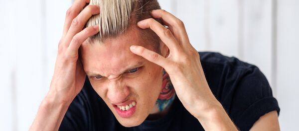 Dolor de cabeza (imagen referencial) - Sputnik Mundo