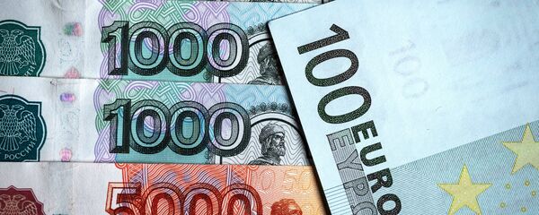 Rublos y euros Rublos y euros - Sputnik Mundo