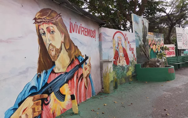 Mural con imágenes religiosas alusivas de Jesúscristo y la Virgen de Coromoto Mural con imágenes religiosas alusivas de Jesúscristo y la Virgen de Coromoto - Sputnik Mundo