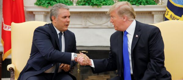 Iván Duque, presidente de Colombia y Donald Trump, presidente de EEUU Iván Duque, presidente de Colombia y Donald Trump, presidente de EEUU - Sputnik Mundo