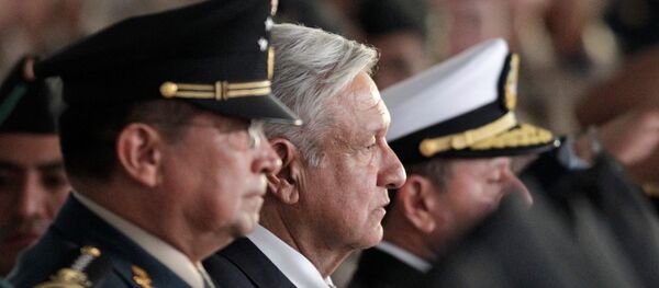 El presidente de México, Andrés Manuel López Obrador, en los festejos del Día del Ejército - Sputnik Mundo