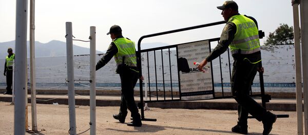 Policía colombiana en el puente Simón Bolívar - Sputnik Mundo