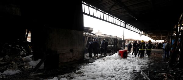 El descarrilamiento de un tren en El Cairo El descarrilamiento de un tren en El Cairo - Sputnik Mundo