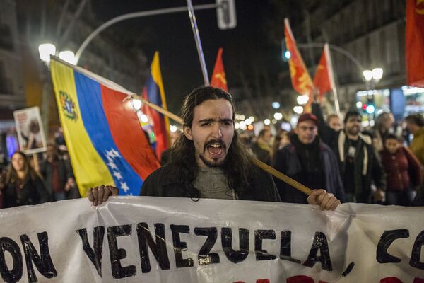 La manifestación en Madrid a favor de Maduro La manifestación en Madrid a favor de Maduro - Sputnik Mundo