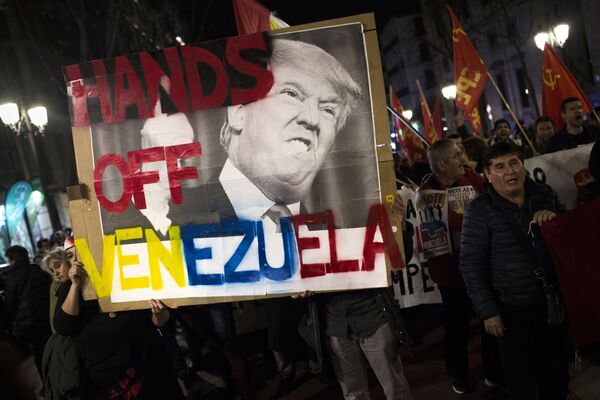 La manifestación en Madrid a favor de Maduro La manifestación en Madrid a favor de Maduro - Sputnik Mundo