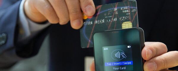 Sistema de pagos (imagen referencial) - Sputnik Mundo