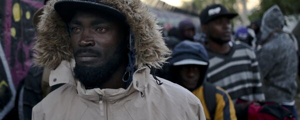 Inmigrantes haitianos en Chile - Sputnik Mundo