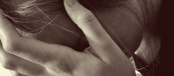 Una mujer desesperada - Sputnik Mundo