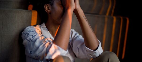 Una mujer - Sputnik Mundo