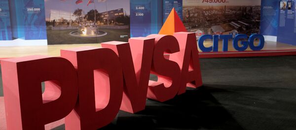 Los logotipos corporativos de la petrolera estatal PDVSA y Citgo Petroleum Corp se ven en Caracas, Venezuela - Sputnik Mundo