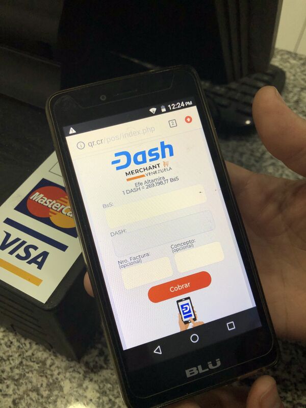 Basta un celular para pagar tu helado con criptomonedas en este negocio de Caracas - Sputnik Mundo