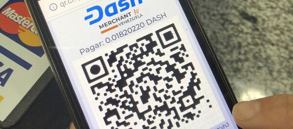 Con un código QR, se genera un pago con criptomonedas en la plataforma Dash, utilizada en algunos comercios de Venezuela Con un código QR, se genera un pago con criptomonedas en la plataforma Dash, utilizada en algunos comercios de Venezuela - Sputnik Mundo