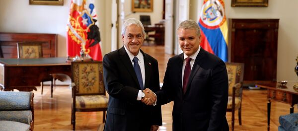 El presidente de Colombia, Iván Duque, y su homólogo chileno, Sebastián Piñera, en Santiago, Chile - Sputnik Mundo