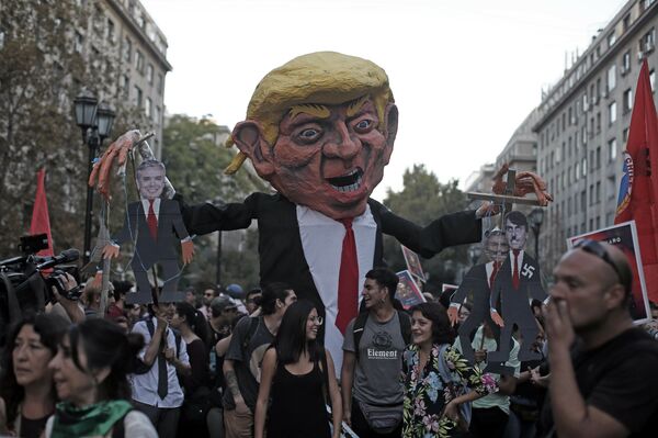 Marcha de protesta en contra del Foro Prosur en Santiago (Chile), el 22 de marzo de 2019 - Sputnik Mundo