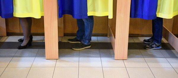 Un colegio electoral en Kiev Un colegio electoral en Kiev - Sputnik Mundo