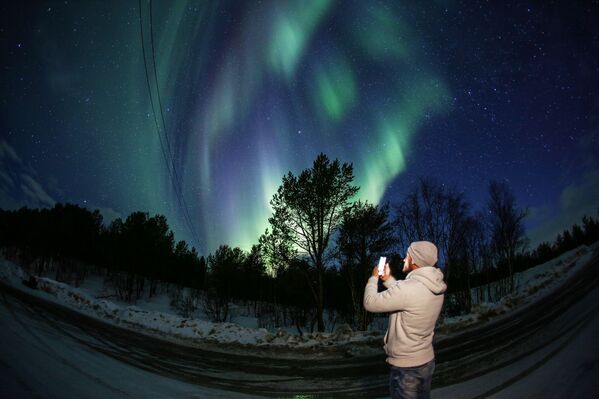 El espectáculo de luz de la naturaleza: descubre las auroras boreales de Múrmansk - Sputnik Mundo