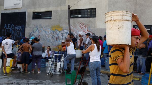 Cese del servicio de agua en Caracas - Sputnik Mundo