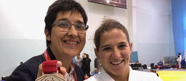 Laura Martinel y Paula Pareto tras obtener una medalla de oro en Rusia, en marzo de 2019 - Sputnik Mundo