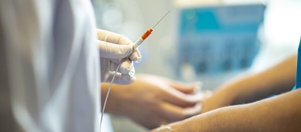 Un médico - Sputnik Mundo