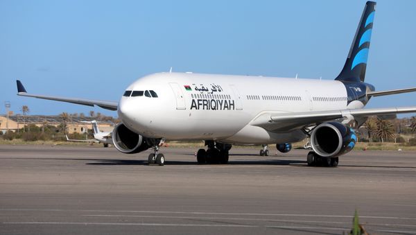Aeropuerto Mitiga en Trípoli Aeropuerto Mitiga en Trípoli - Sputnik Mundo
